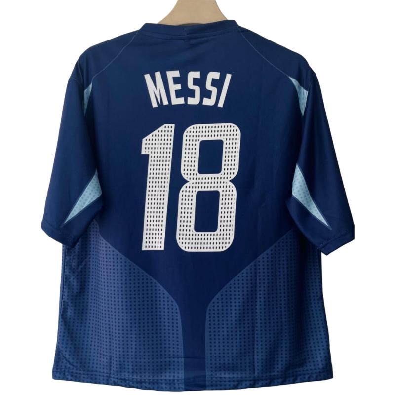 Argentina 2004-2005 away football jersey with the number "18" Lionel Messi